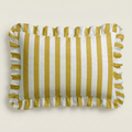 Rectangular pillow with yellow and white vertical stripes on a beige background