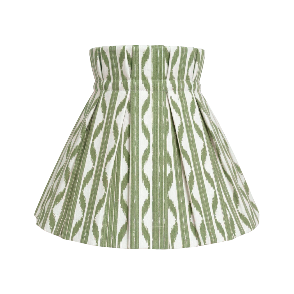 Green and white patterned shade cover on a white background