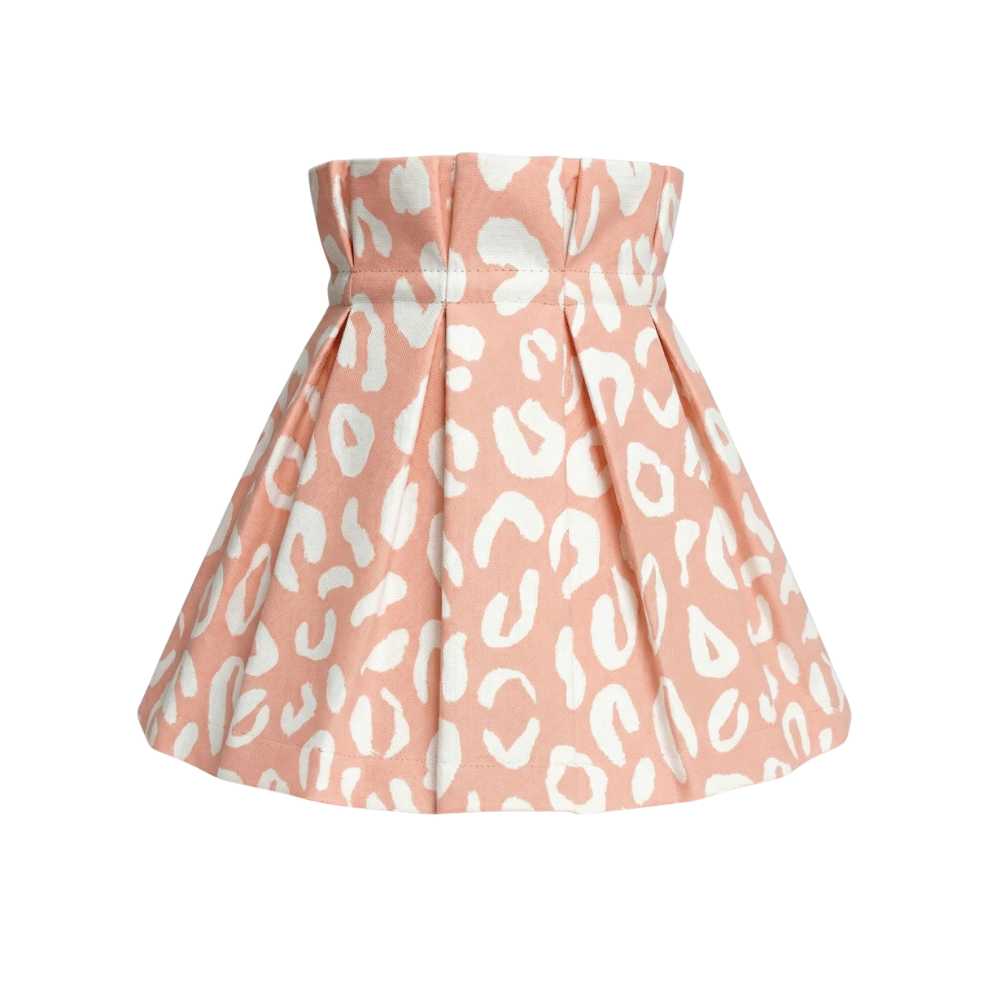Pink skirt with white pattern on a white background