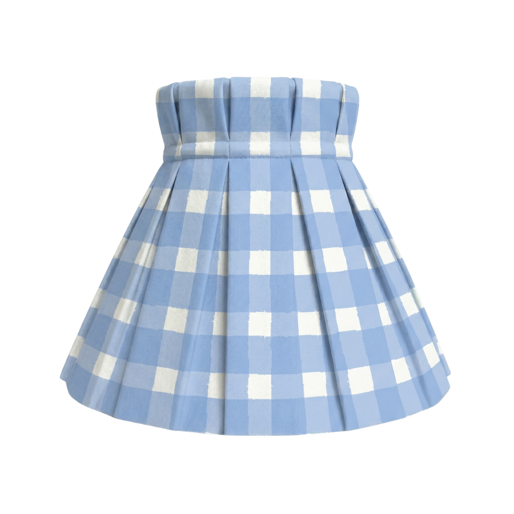 Blue and white checkered shade cover on a white background
