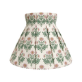 Floral patterned shade cover on a white background