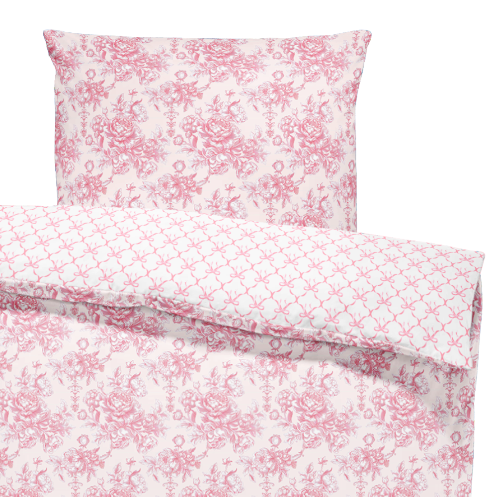 Floral patterned bedding set with pink and white design on a white background