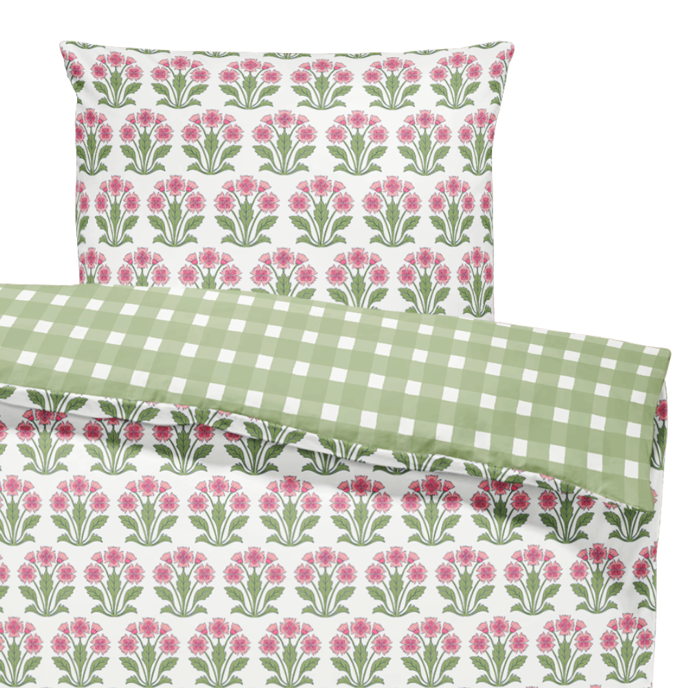 Floral and checkered patterned pillowcases on a white background