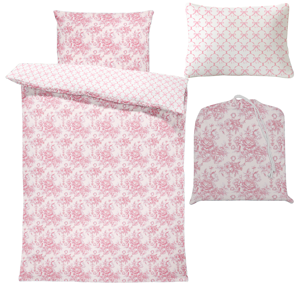 Floral bedding set with two pillows and a cover on a white background
