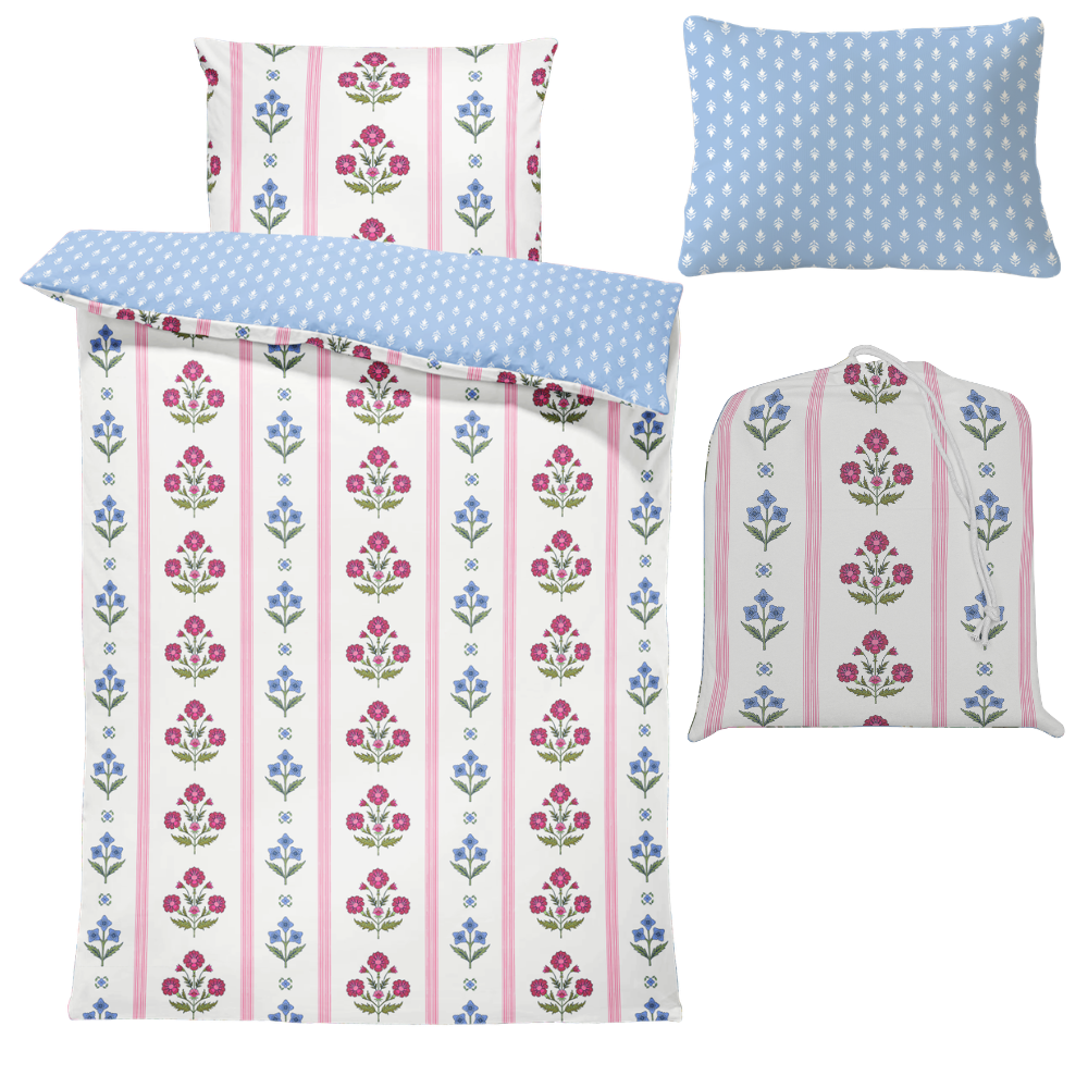 Floral and striped bedding set with matching cover on a white background