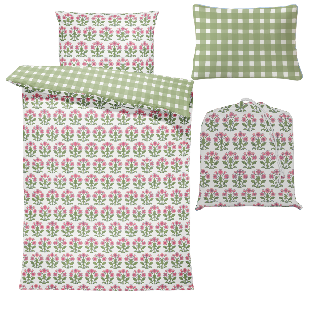 Floral and checkered patterned bed sheets and pillowcases on a white background