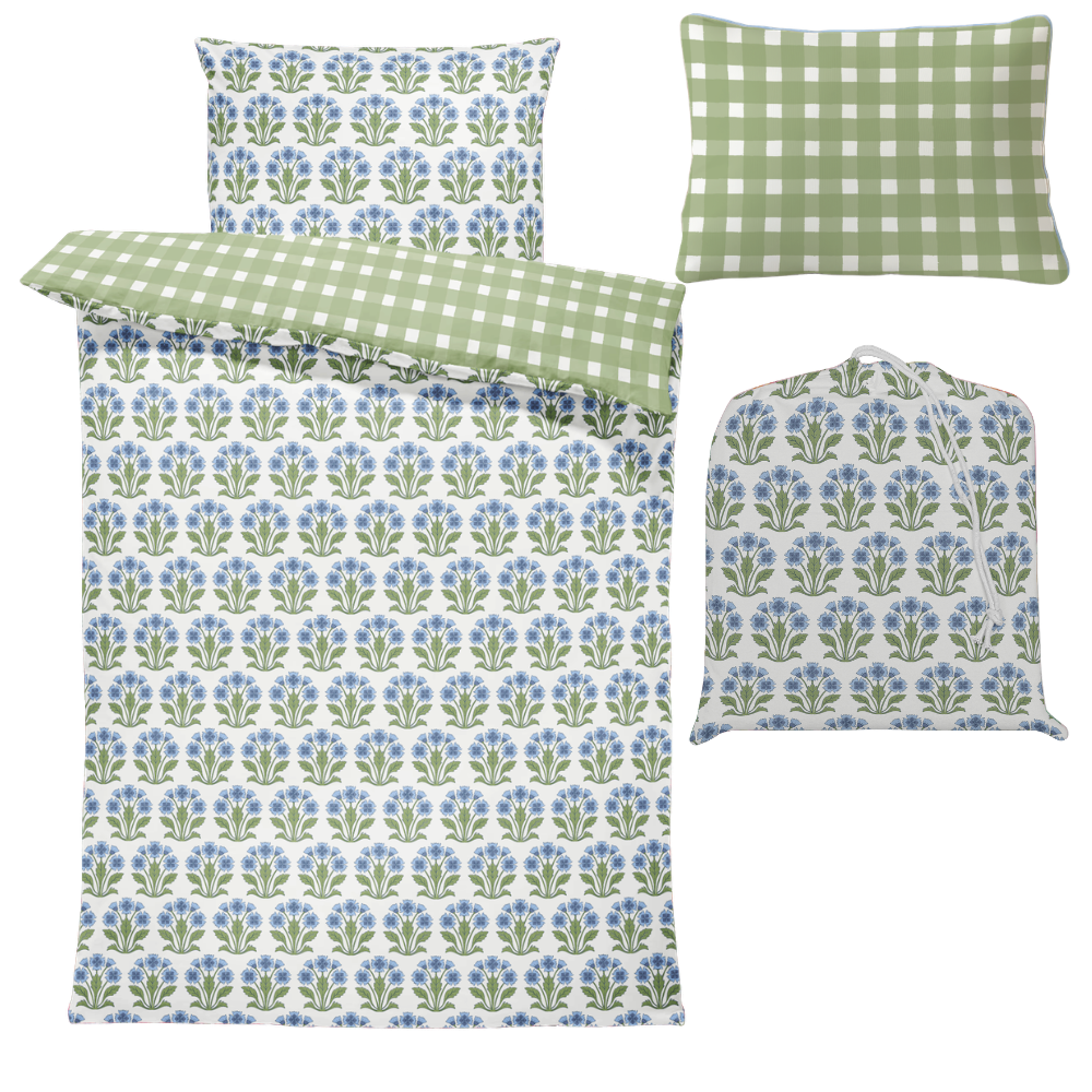 Floral and checkered patterned bedding set with a matching bag on a white background