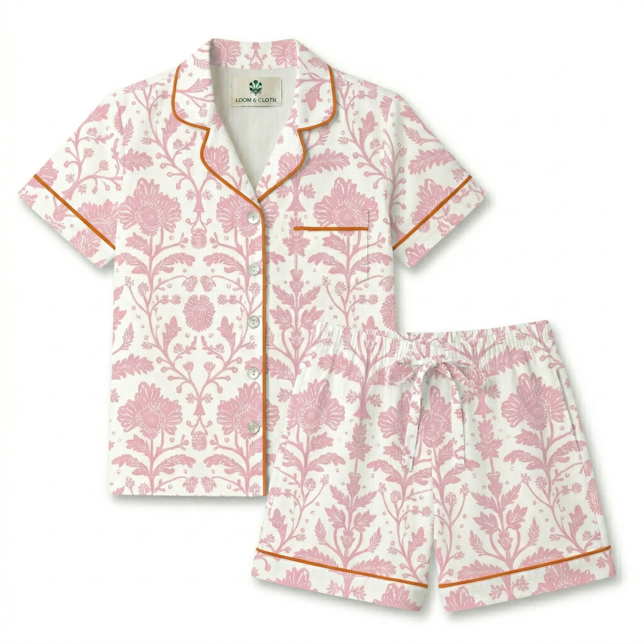 Floral pajama set with pink and white pattern on a white background