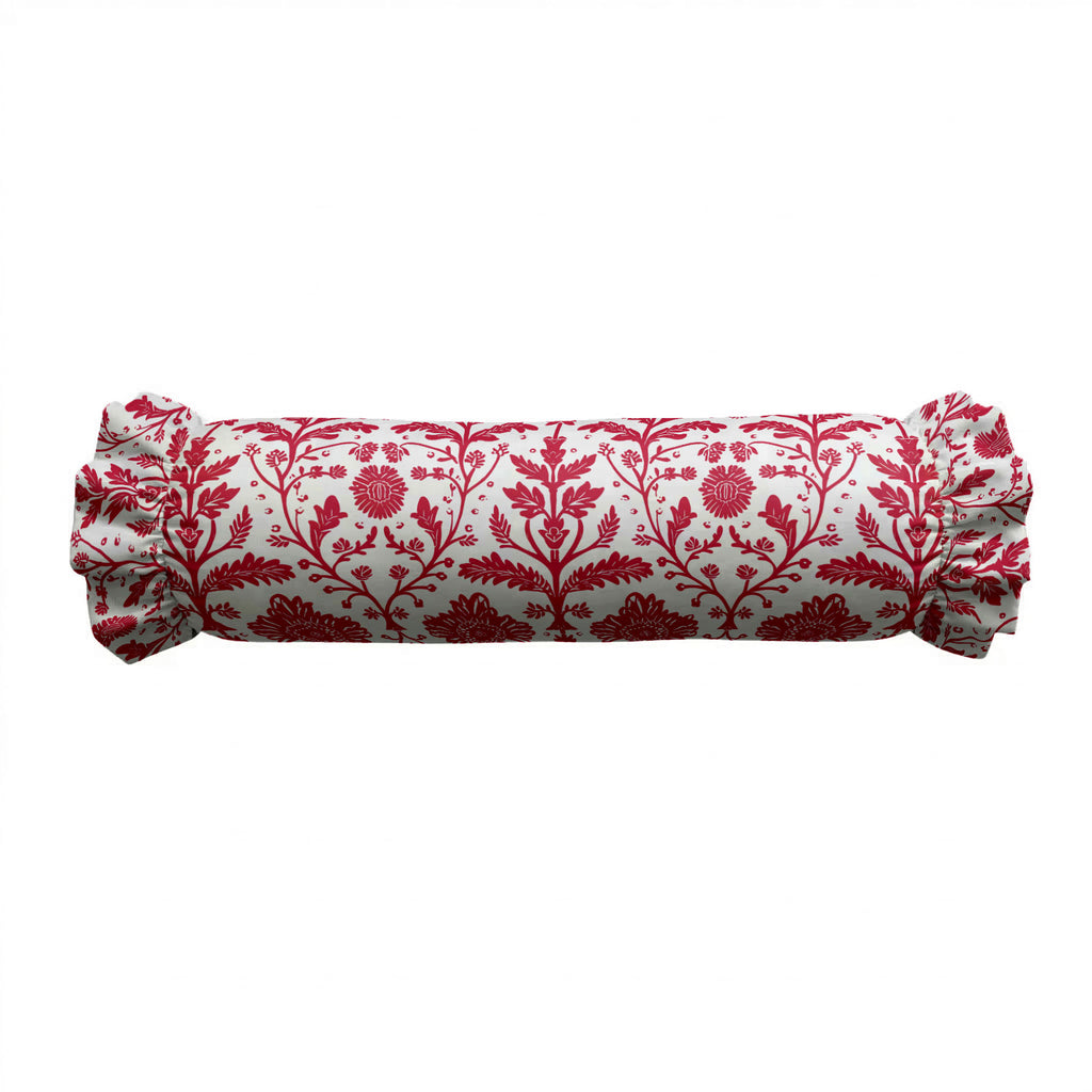 Roll of fabric with red floral pattern on a white background