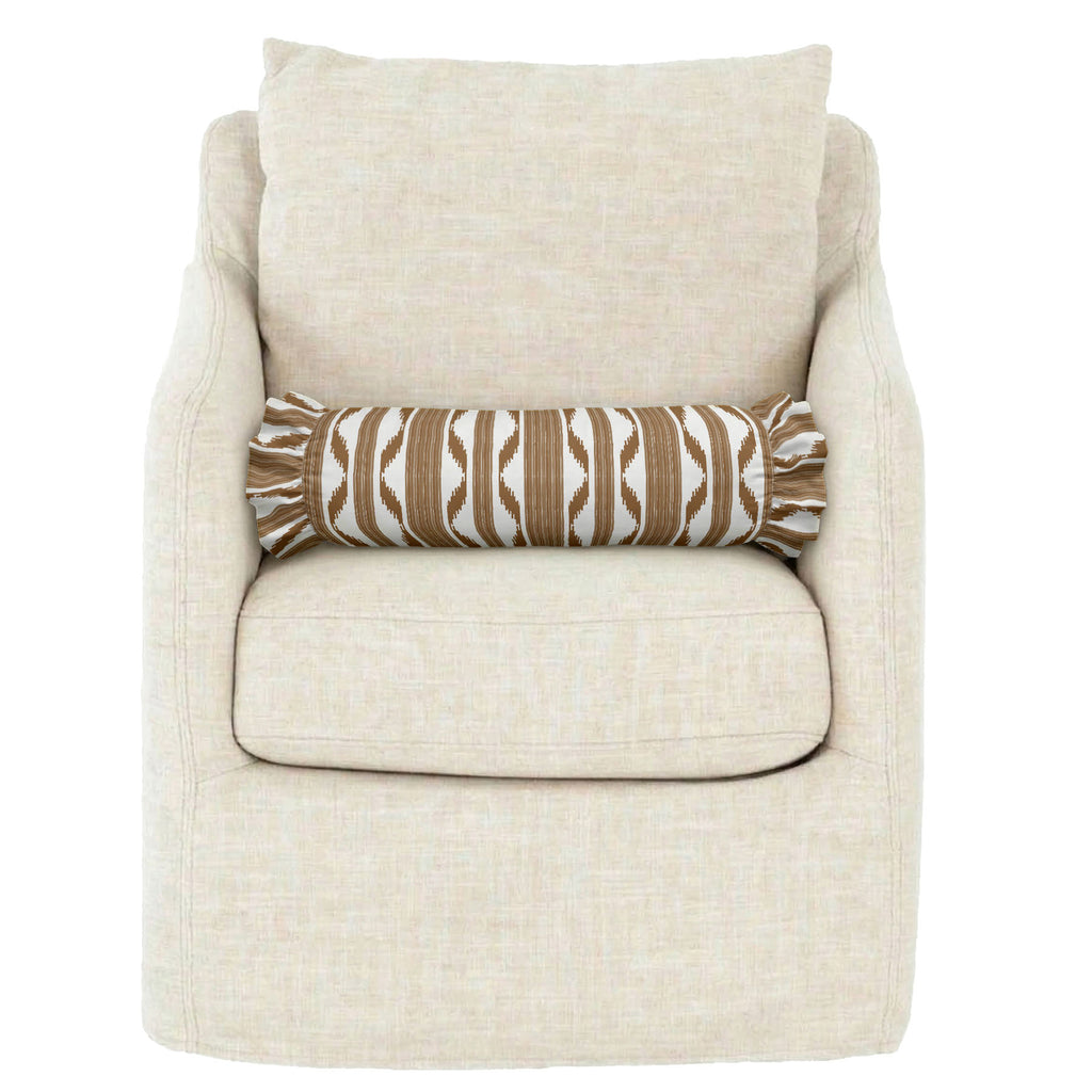 Beige armchair with a decorative pillow on a white background