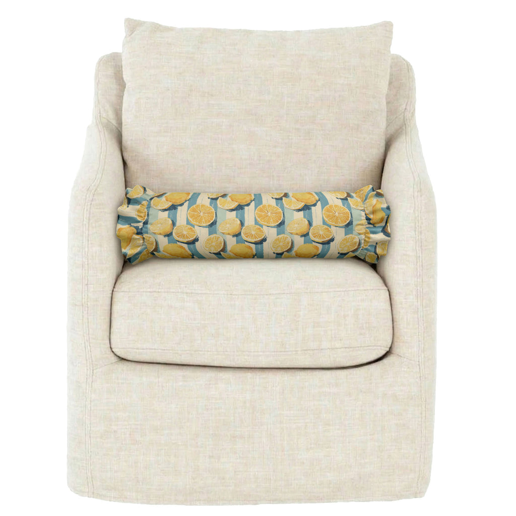 Beige armchair with a decorative cylindrical pillow featuring yellow patterns on a white background
