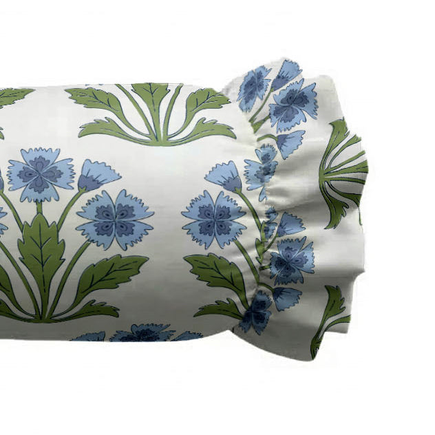 Folded fabric with blue floral and green leaf pattern on a white background