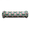 Rolled-up fabric with floral pattern on a white background