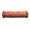 Roll of fabric with pink floral pattern on a white background