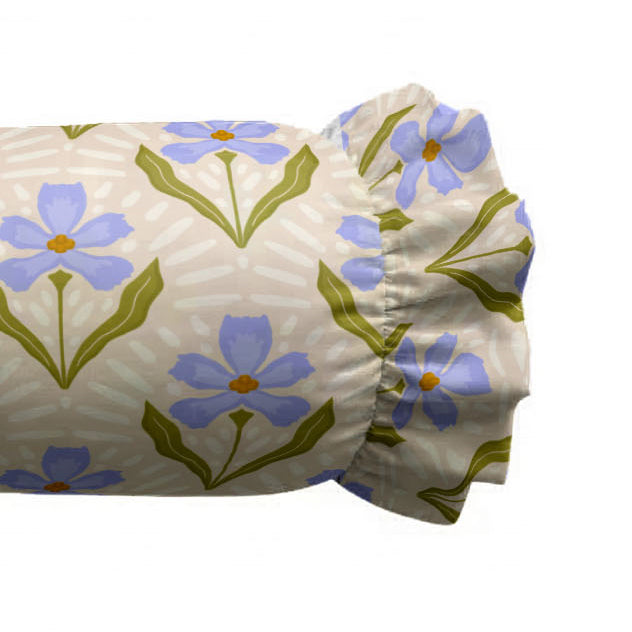 Floral-patterned pillowcase with blue flowers and green leaves on a white background