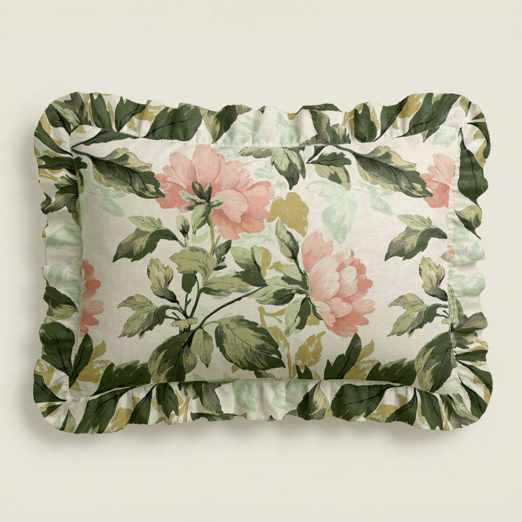 Floral and leaf patterned pillow on a light background