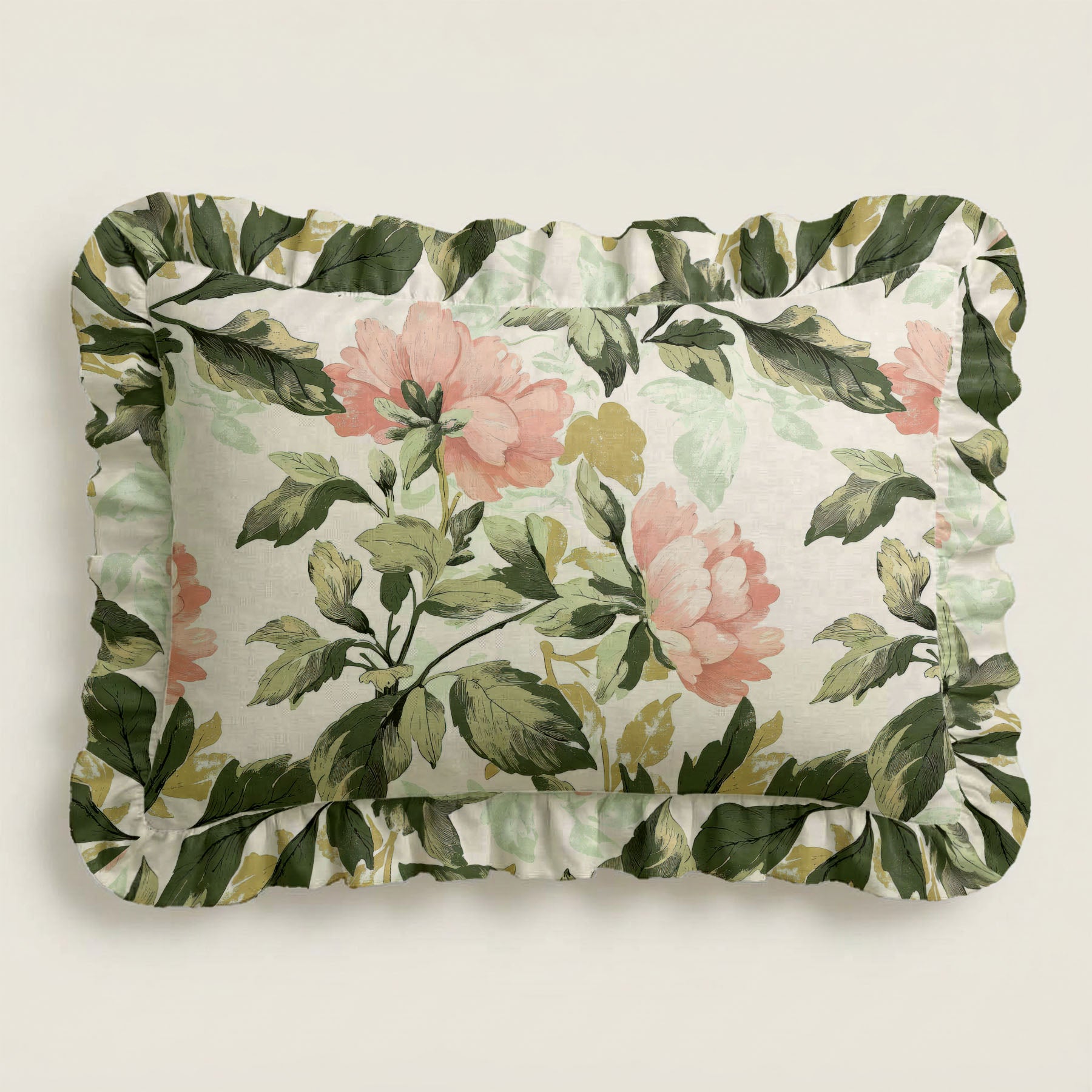 Floral and leaf patterned pillow on a light background