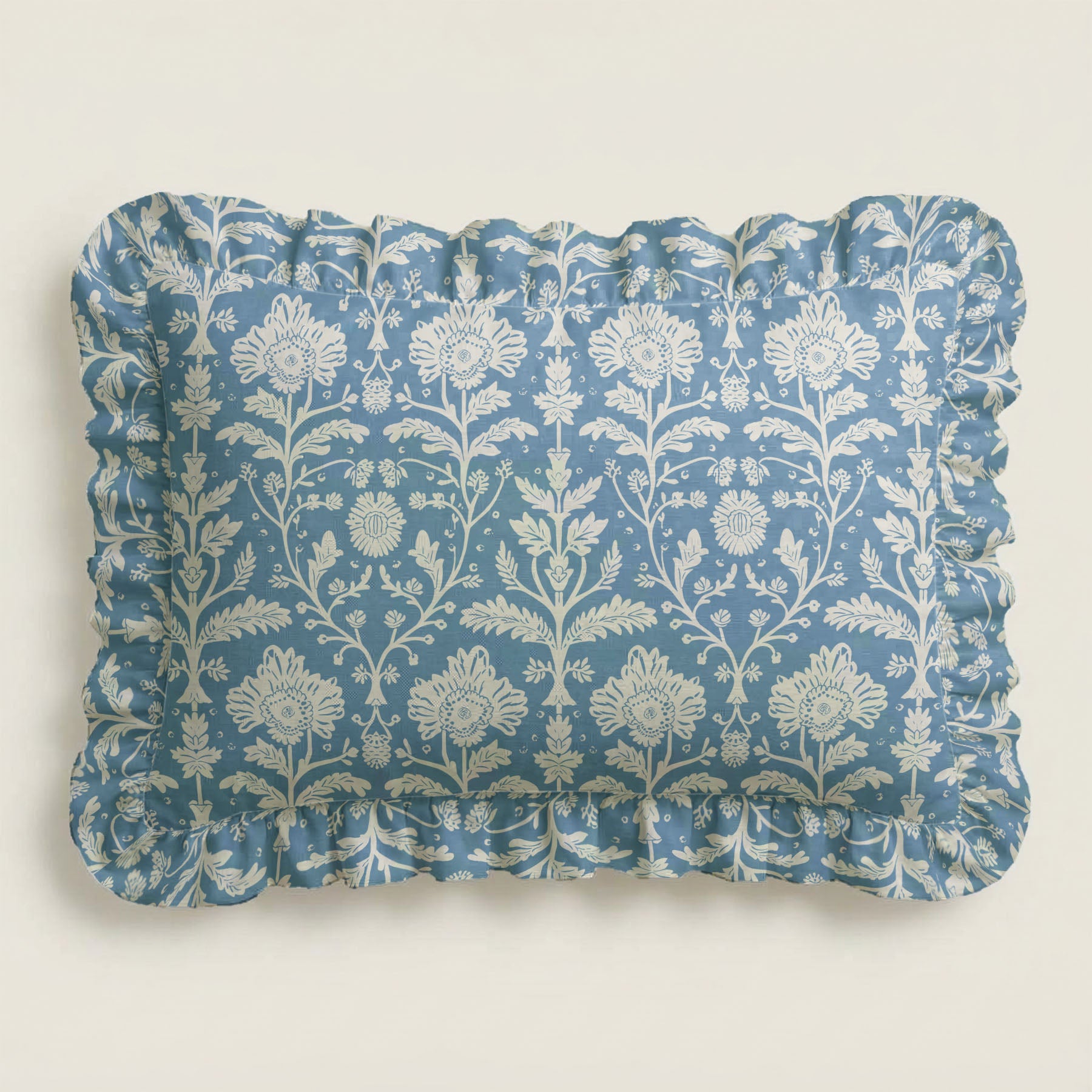 Decorative pillow with floral pattern on a plain background