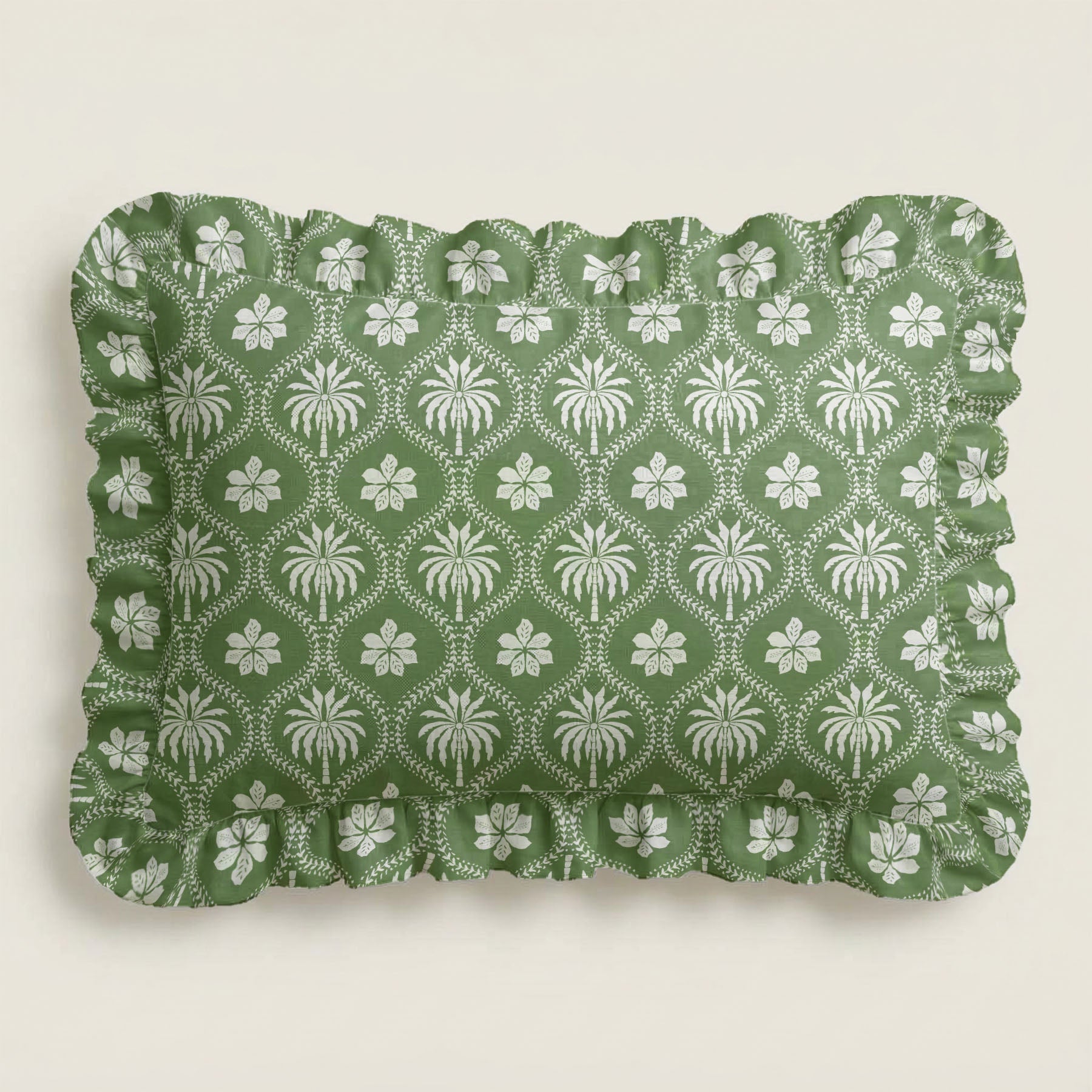 Green fabric with white floral pattern on a beige background