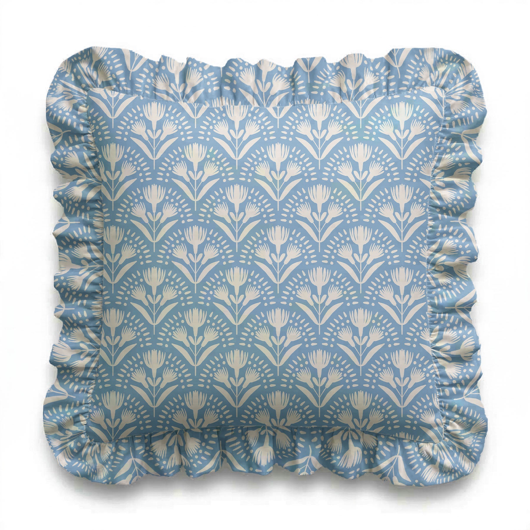 Decorative pillow with floral pattern and ruffled edge on a white background