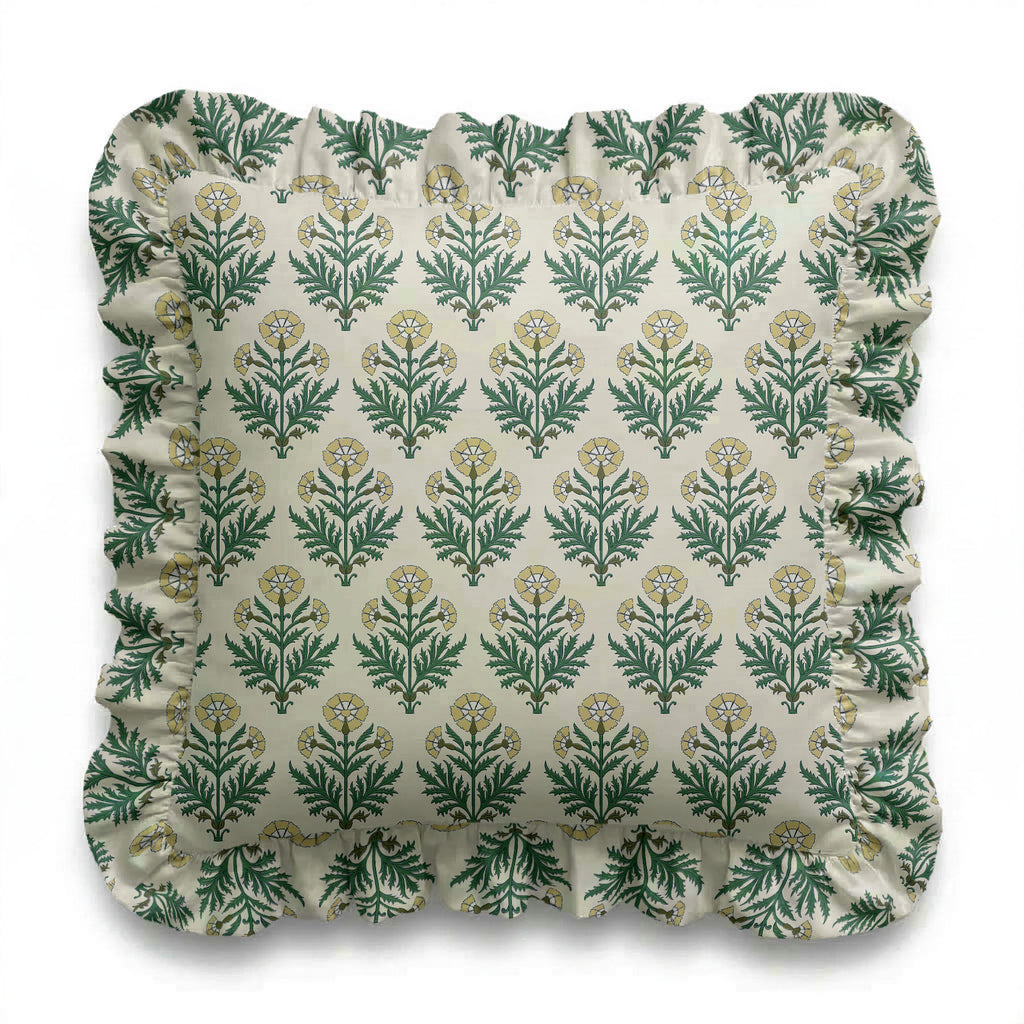 Decorative pillow with green floral pattern on a white background