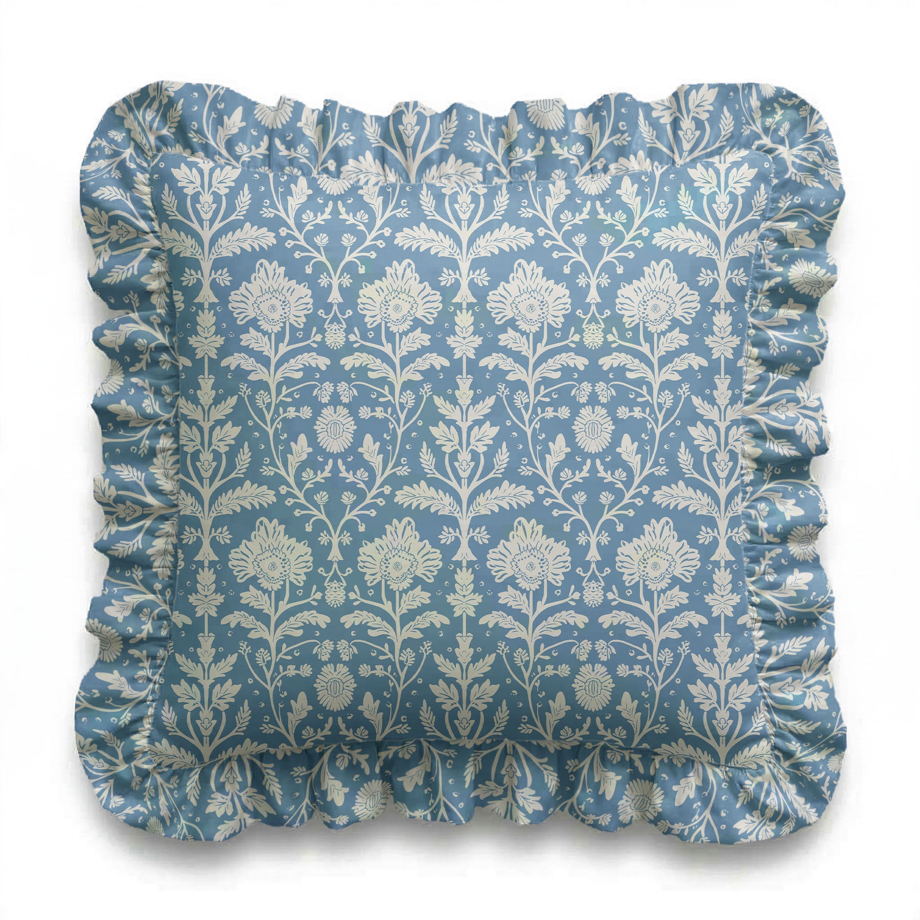 Decorative pillow with floral pattern and ruffled edge on a white background