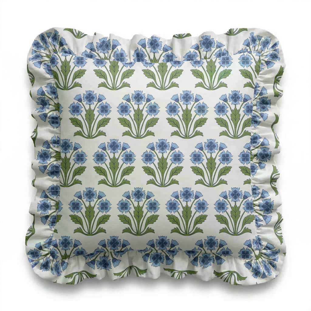 Decorative pillow with blue floral pattern on a white background