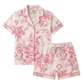 Pink floral pajama set on a white background