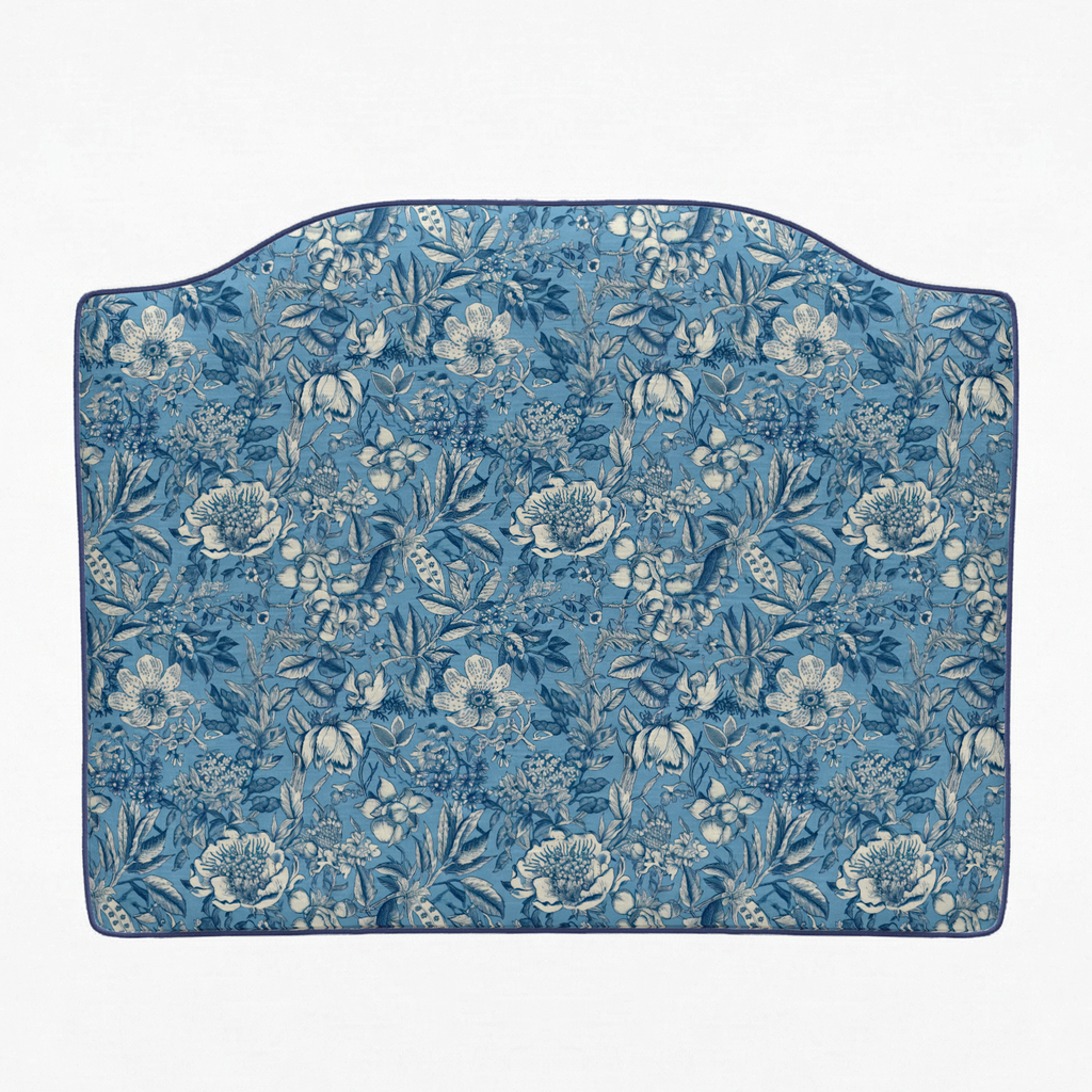 Floral patterned headboard on a white background