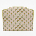 Decorative headboard with floral pattern on a white background