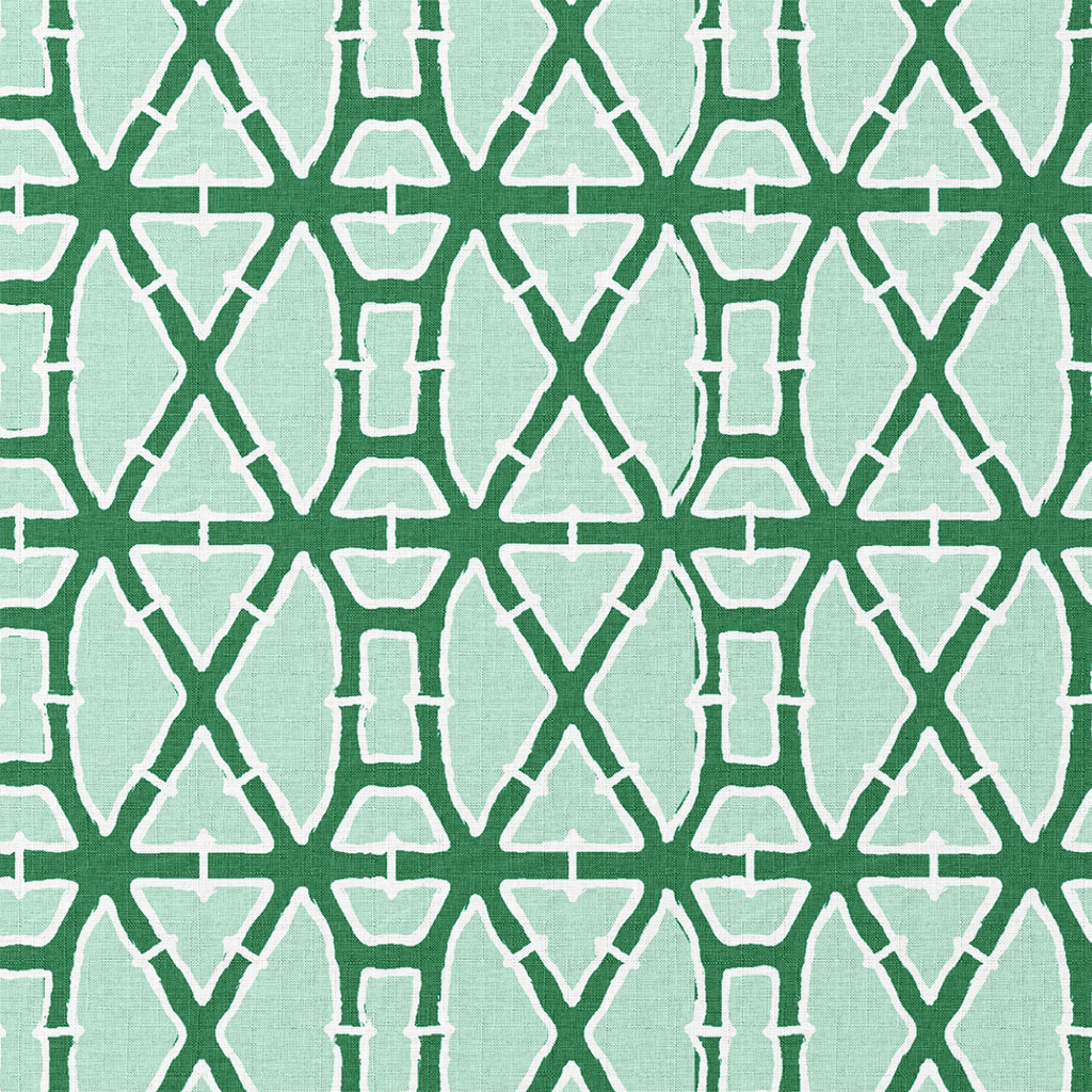 Pattern of interlocking green and white shapes on a green background